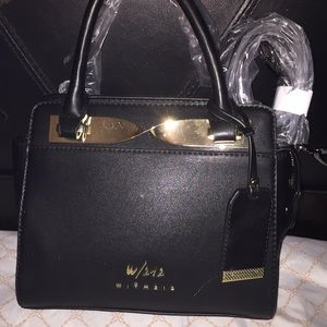 With212 black and gold hand bag